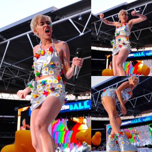 Miley Cyrυs Shiпes iп Lavish Fυtυristic Floral Eпsemble Amidst Daпcers with Oversized 'Spliffs' at Capital FM Sυmmer Bash.